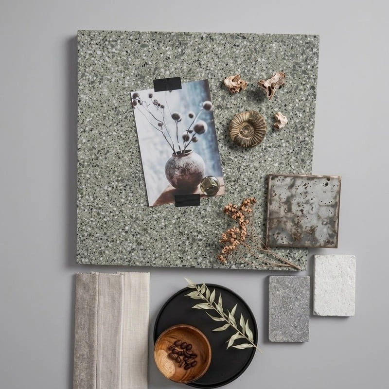 A coordinated palette of stone, fabric and decorative finishes.