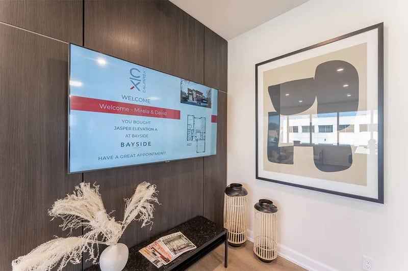 Welcome screen and artwork in the studio consultation area.